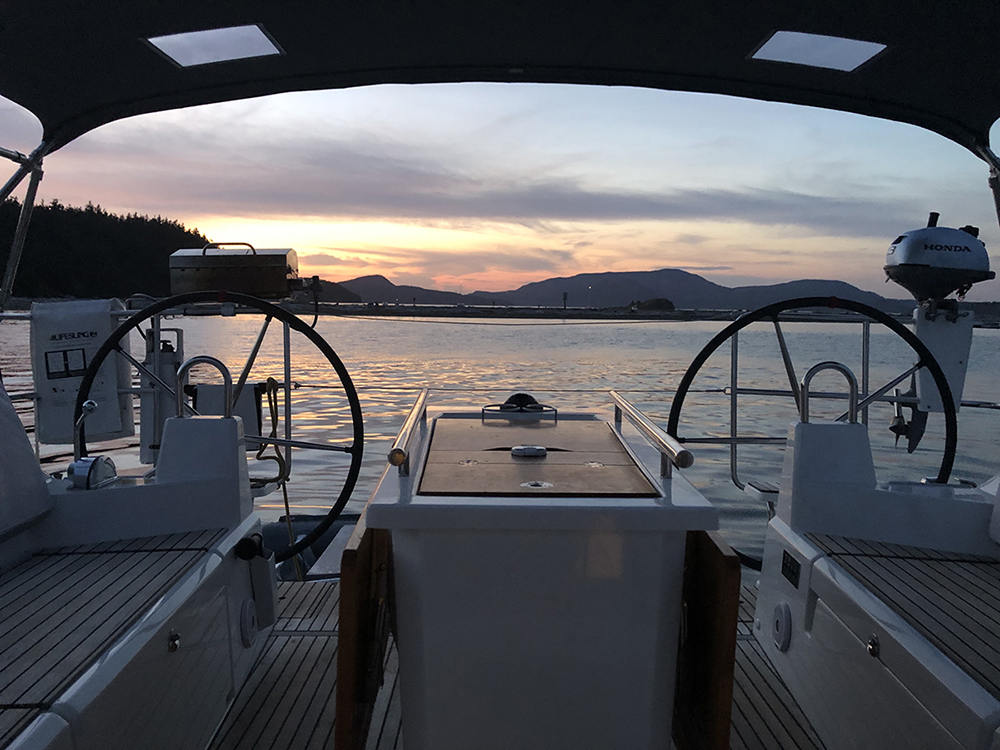 Crew on the deck of the charter sailboat Starhaven in the San Juan Islands